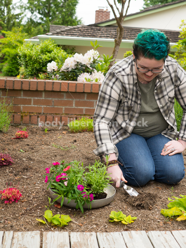 Diverse Gardening Stock Photo: Agender Person Plants Seedling - Body Liberation Photos