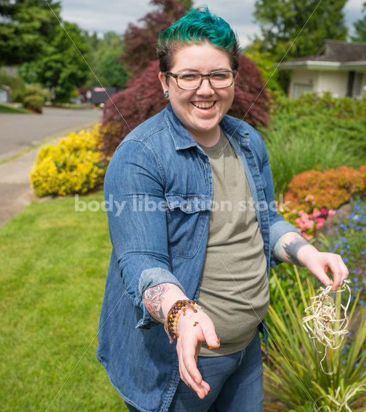 Diverse Gardening Stock Photo: Agender Person Releases Ladybugs in Garden - Body Liberation Photos