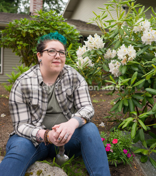 Diverse Gardening Stock Photo: Agender Person Sitting with Trowel - Body Liberation Photos