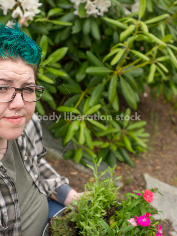 Diverse Gardening Stock Photo: Agender Person with Trowel and Seedlings - Body Liberation Photos