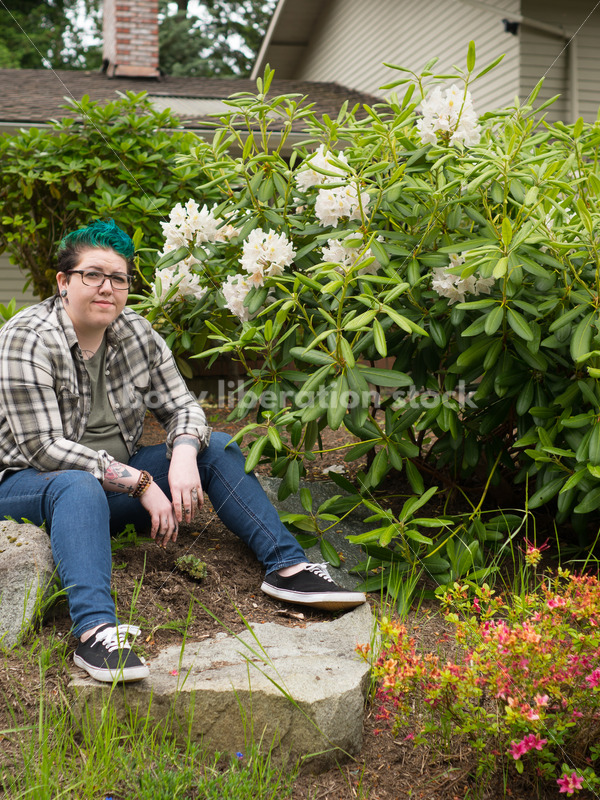 Diverse Gardening Stock Photo: Agender Person with Trowel and Seedlings - Body Liberation Photos
