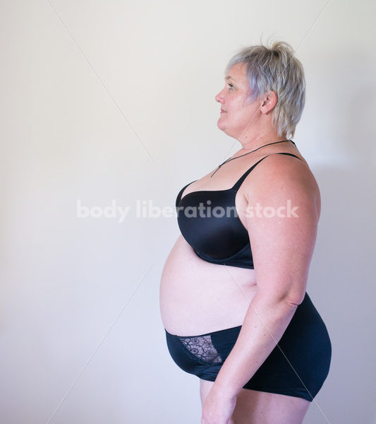 Eating Disorder Recovery Body Image Stock Photo: Side View of Recovering Woman - Body Liberation Photos