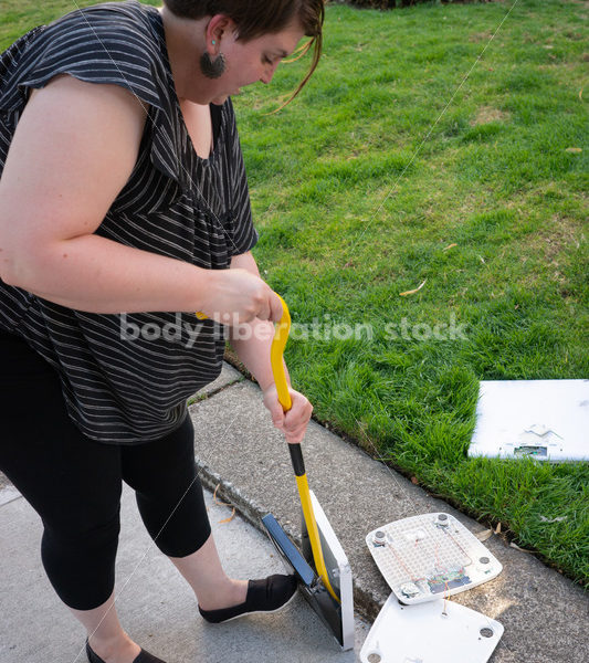 Eating Disorder Recovery Stock Photo: Scale Smashing - Body Liberation Photos