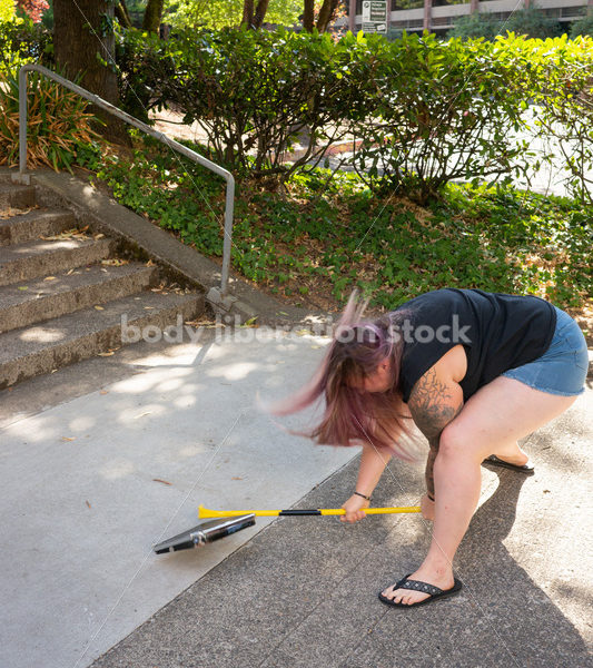 Eating Disorder Recovery Stock Photo: Scale Smashing - Body Liberation Photos