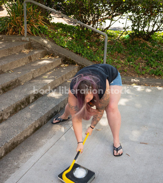 Eating Disorder Recovery Stock Photo: Scale Smashing - Body Liberation Photos