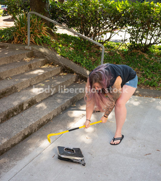 Eating Disorder Recovery Stock Photo: Scale Smashing - Body Liberation Photos