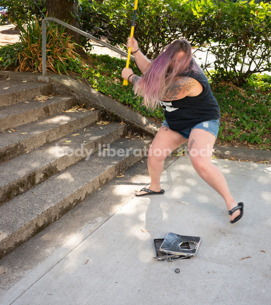 Eating Disorder Recovery Stock Photo: Scale Smashing - Body Liberation Photos