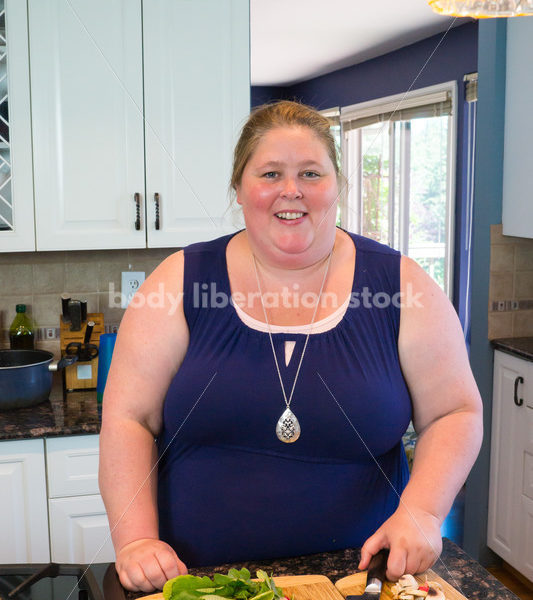 Eating Disorder Recovery Stock Photo: Woman Chopping Peppers on Kitchen Counter - Body Liberation Photos