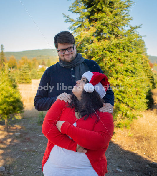 Holiday Stock Image: Plus-Size Couple at a Tree Farm - Body Liberation Photos