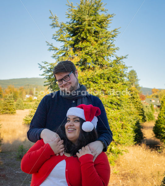 Holiday Stock Image: Plus-Size Couple at a Tree Farm - Body Liberation Photos