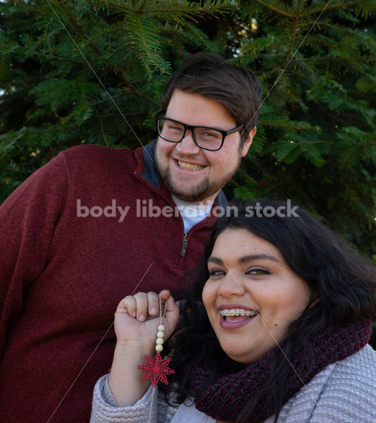 Holiday Stock Image: Plus-Size Couple at a Tree Farm - Body Liberation Photos