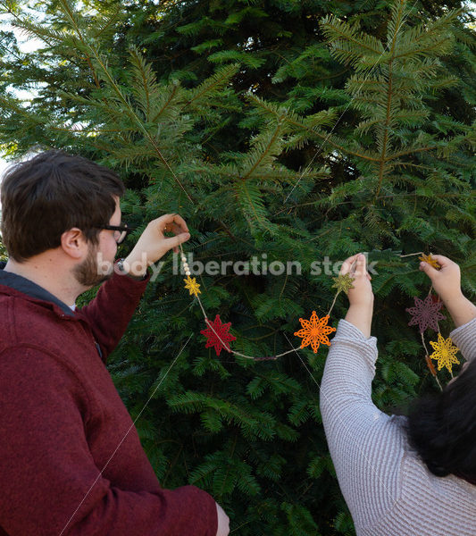 Holiday Stock Image: Plus-Size Couple at a Tree Farm - Body Liberation Photos