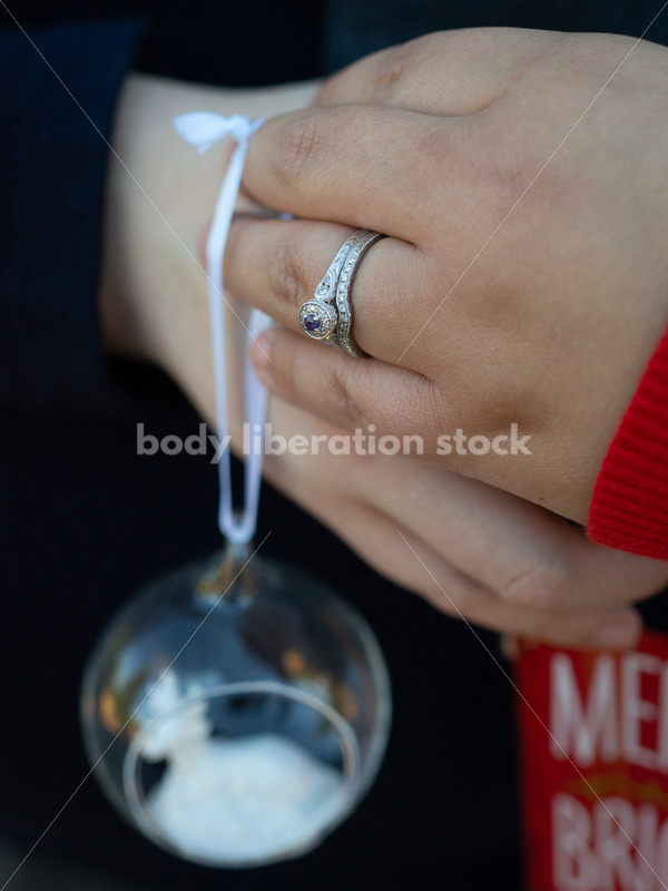 Holiday Stock Image: Plus-Size Couple with Christmas Tree Ornaments - Body Liberation Photos