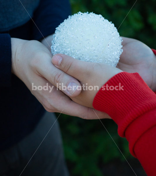 Holiday Stock Image: Plus-Size Couple with Christmas Tree Ornaments - Body Liberation Photos