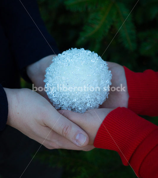 Holiday Stock Image: Plus-Size Couple with Christmas Tree Ornaments - Body Liberation Photos