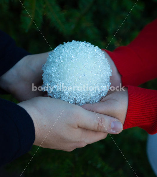 Holiday Stock Image: Plus-Size Couple with Christmas Tree Ornaments - Body Liberation Photos