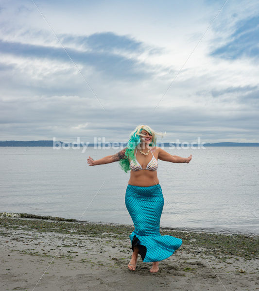 Joyful Movement Stock Image: Mermaid Jumps and Twirls - Body Liberation Photos