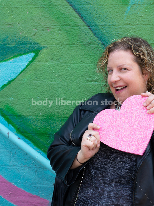 Love, Romance, Valentines Stock Photo: Plus-Size Woman Holding Heart - Body Liberation Photos