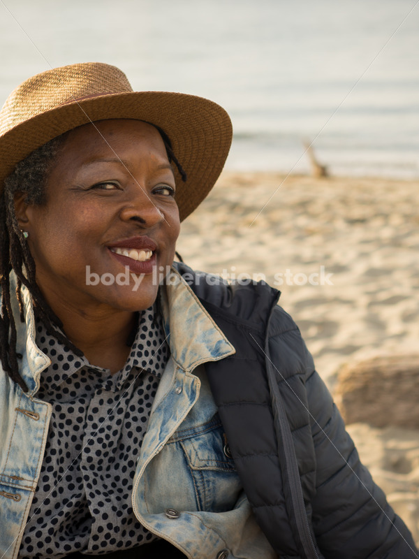 Plus-Size African American Woman Outdoors Relaxing on Beach - Body Liberation Photos