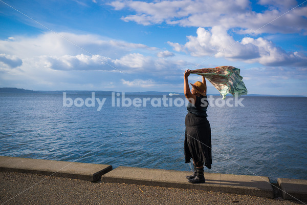 Plus-Size African American Woman Outdoors with Winged Scarf - Body Liberation Photos