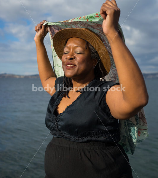 Plus-Size African American Woman Outdoors with Winged Scarf - Body Liberation Photos