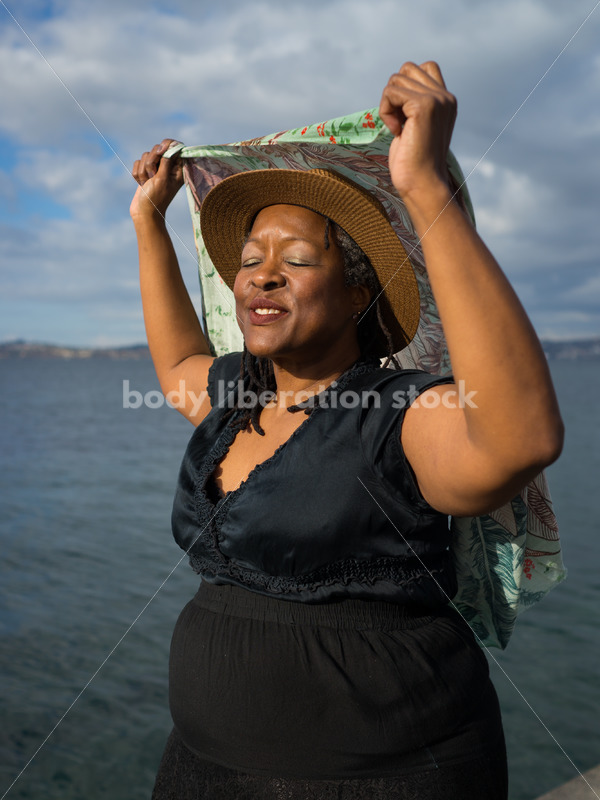 Plus-Size African American Woman Outdoors with Winged Scarf - Body Liberation Photos