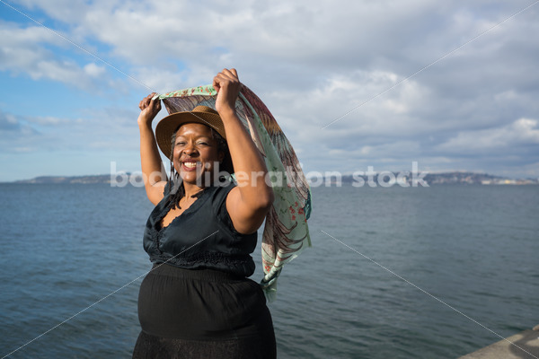 Plus-Size African American Woman Outdoors with Winged Scarf - Body Liberation Photos