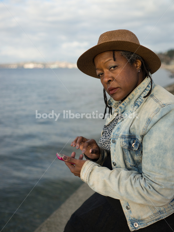 Plus-Size African American Woman with Smartphone - Body Liberation Photos