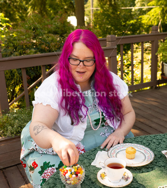 Plus-Size Woman Enjoying Food and Drink at a Tea Party - Body Liberation Photos