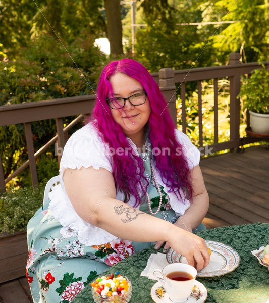 Plus-Size Woman Enjoying Food and Drink at a Tea Party - Body Liberation Photos