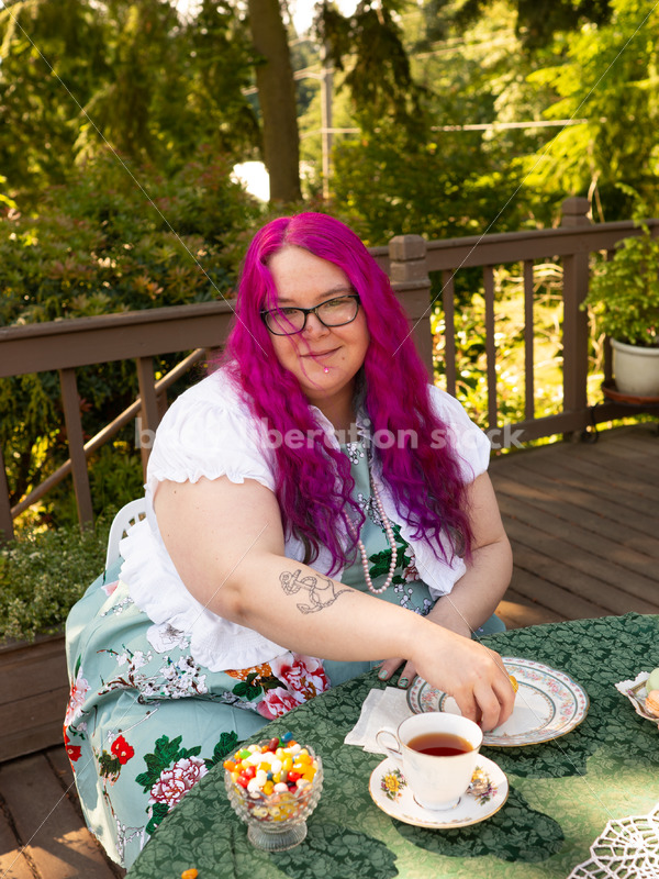 Plus-Size Woman Enjoying Food and Drink at a Tea Party - Body Liberation Photos