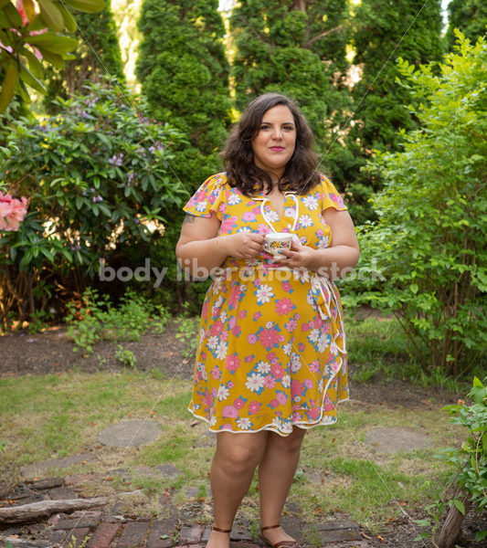 Plus-Size Woman with Teacup in Garden - Body Liberation Photos