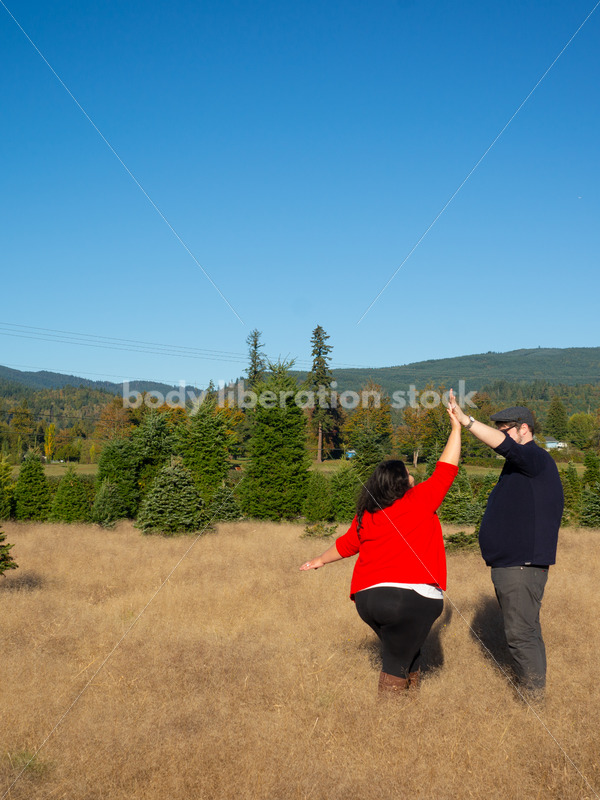 Romance Stock Image: Couple Dancing in Field - Body Liberation Photos