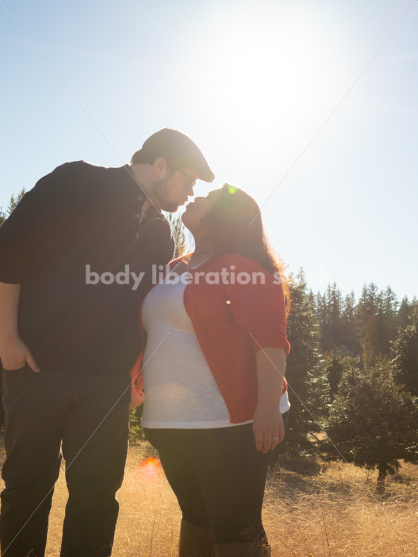 Romance Stock Image: Couple Kissing in Field - Body Liberation Photos