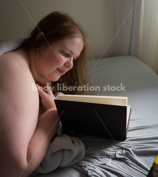 Self Care Stock Photo: Plus-Size Woman Reading in Bed - Body Liberation Photos