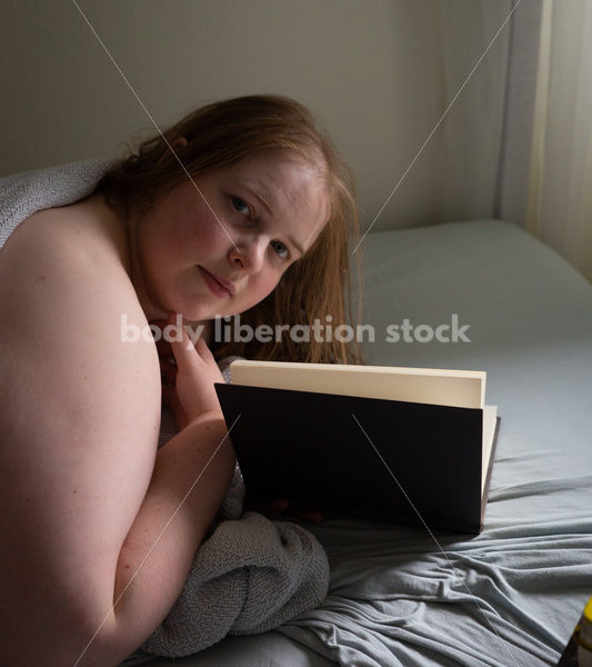 Self Care Stock Photo: Plus-Size Woman Reading in Bed - Body Liberation Photos