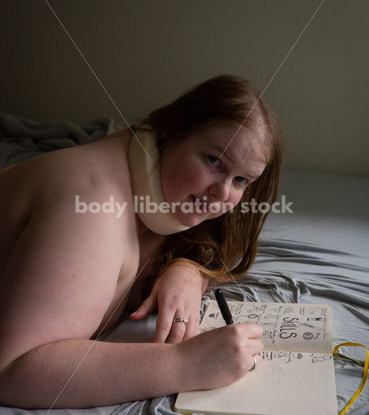 Self Care Stock Photo: Plus-Size Woman Writing and Journaling in Bed - Body Liberation Photos