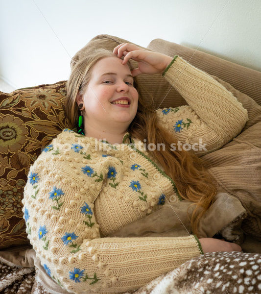 Self Care Stock Photo: Plus-Size Woman on Couch - Body Liberation Photos