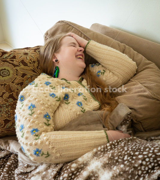 Self Care Stock Photo: Plus-Size Woman on Couch - Body Liberation Photos