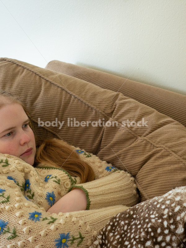 Self Care Stock Photo: Plus-Size Woman on Couch - Body Liberation Photos