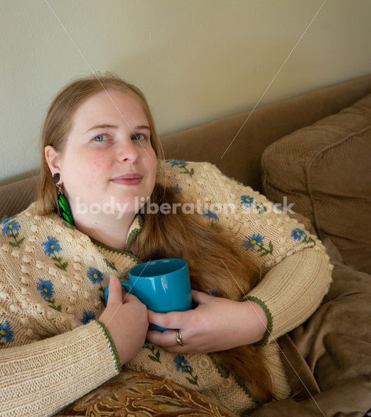 Self Care Stock Photo: Plus-Size Woman on Couch - Body Liberation Photos