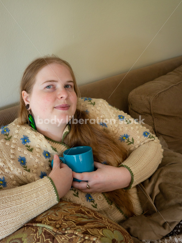 Self Care Stock Photo: Plus-Size Woman on Couch - Body Liberation Photos