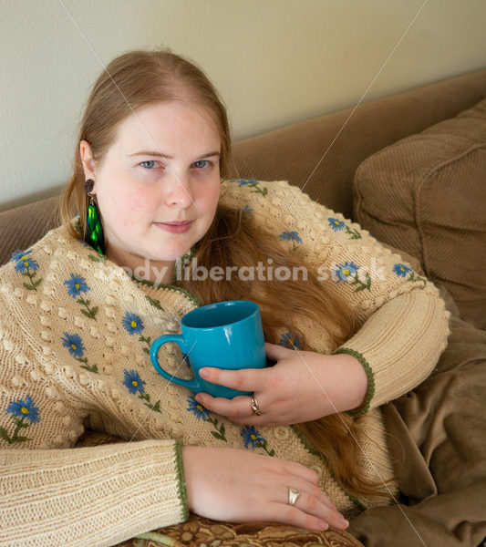 Self Care Stock Photo: Plus-Size Woman on Couch - Body Liberation Photos