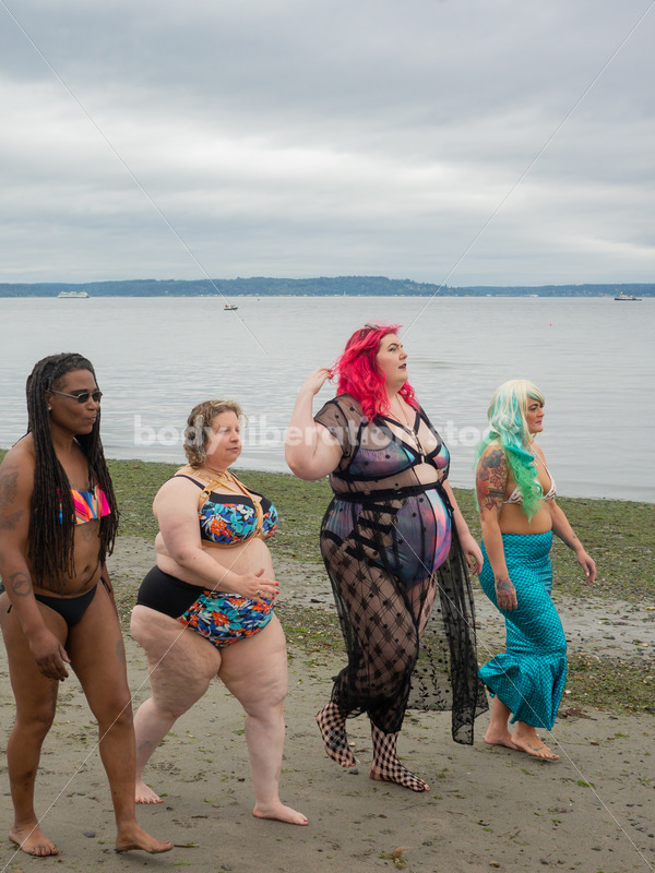 Stock Image: Group of friends walking on beach - Body Liberation Photos