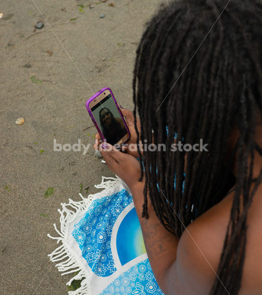 Technology Stock Image: Smartphone on the Beach - Body Liberation Photos