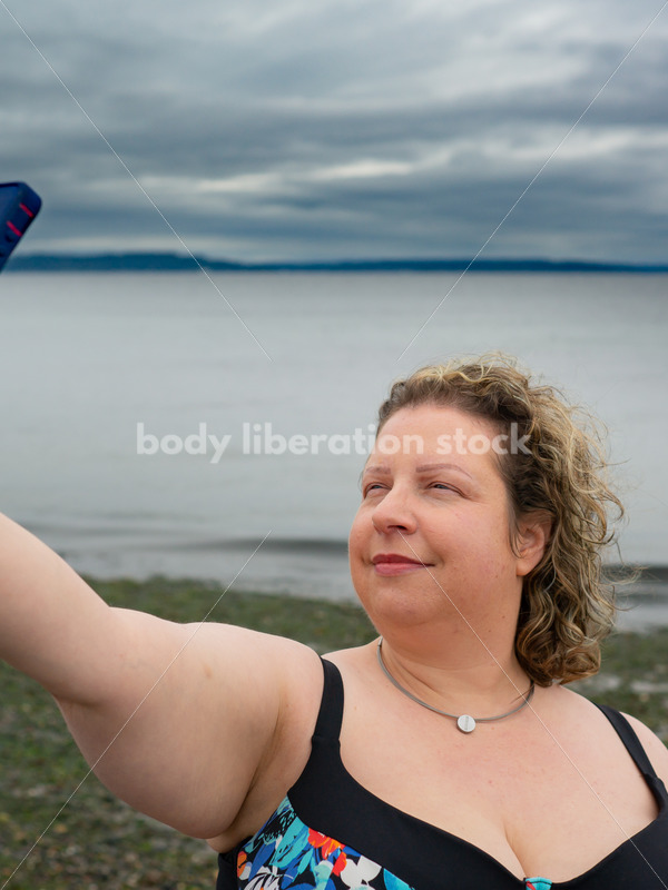 Technology Stock Image: Smartphone on the Beach - Body Liberation Photos