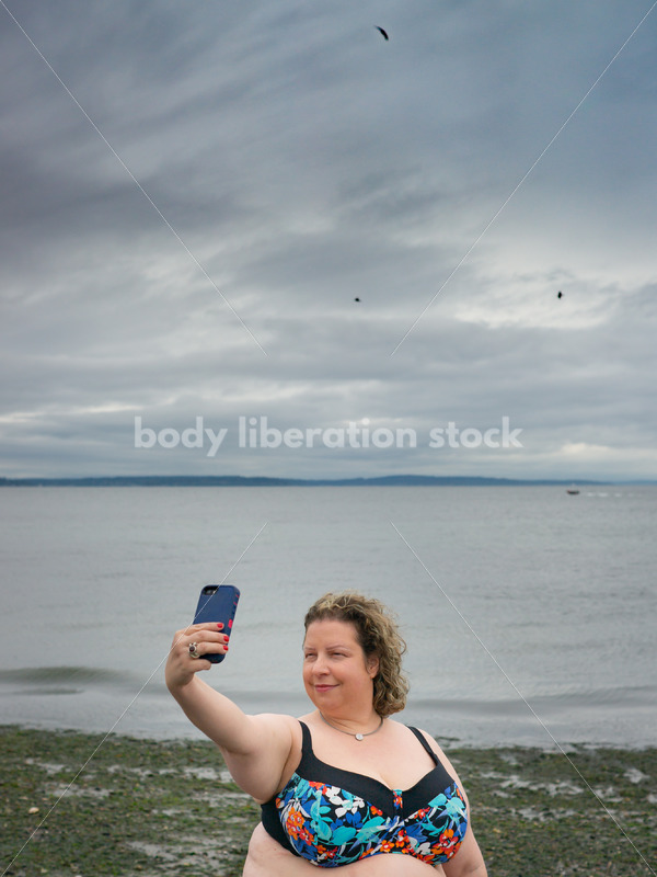 Technology Stock Image: Smartphone on the Beach - Body Liberation Photos