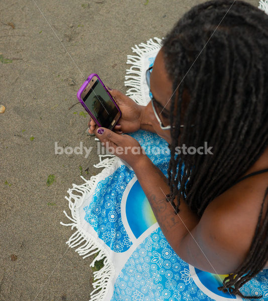 Technology Stock Image: Smartphone on the Beach - Body Liberation Photos