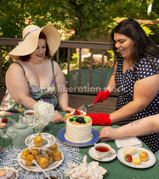 Woman Cuts Cake at Tea Party - Body Liberation Photos