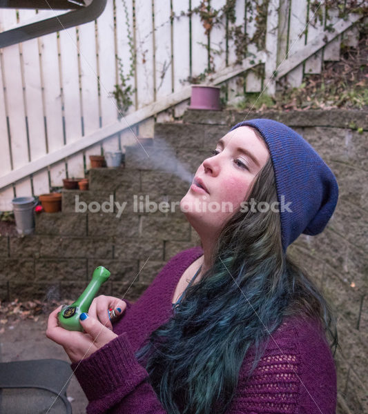 A young caucasian woman smokes legal marijuana in Washington state - Body Liberation Photos